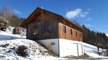 Holzriegelbau mit Fassadenschalung