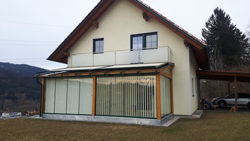 Holzriegelbau - Einfamilienhaus mit Wintergarten